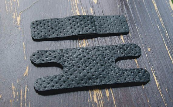 Black leather Band-aids and Louis Vuitton band aids