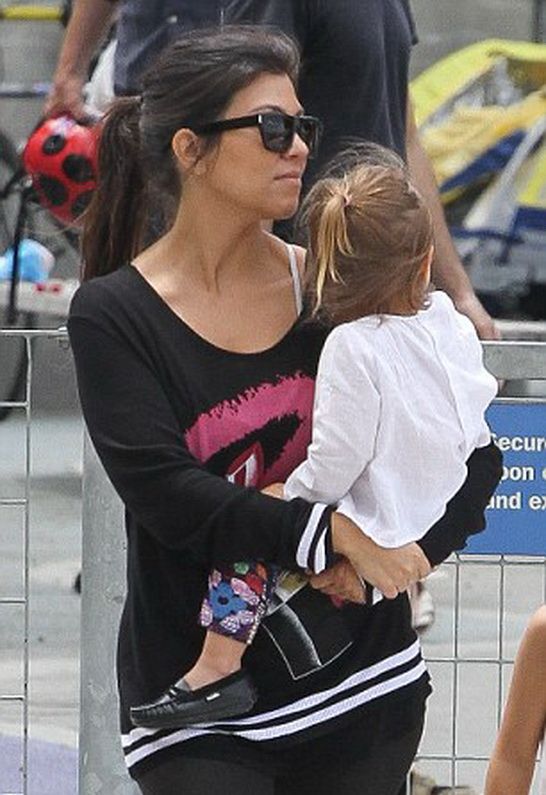 Kourtney Kardashian in Lauren Moshi