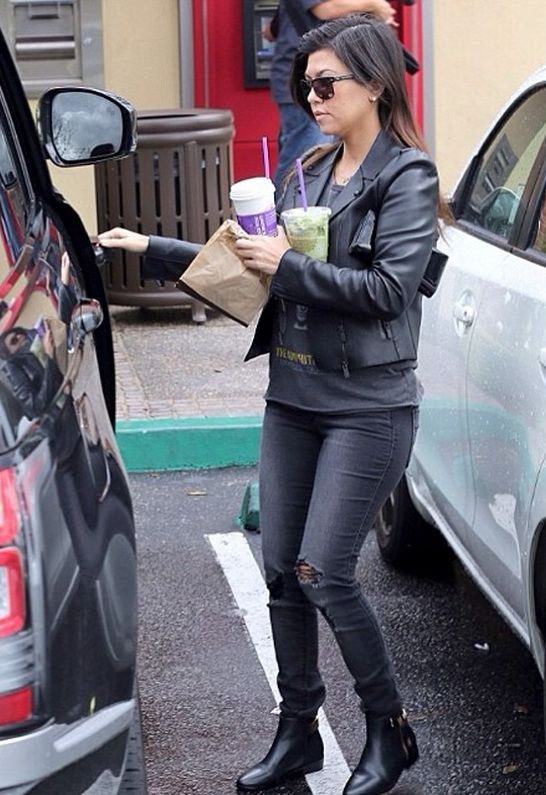 Kourtney Kardashian in Black Orchid