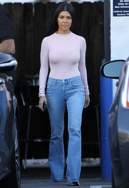 Kourtney Kardashian in A Gold E